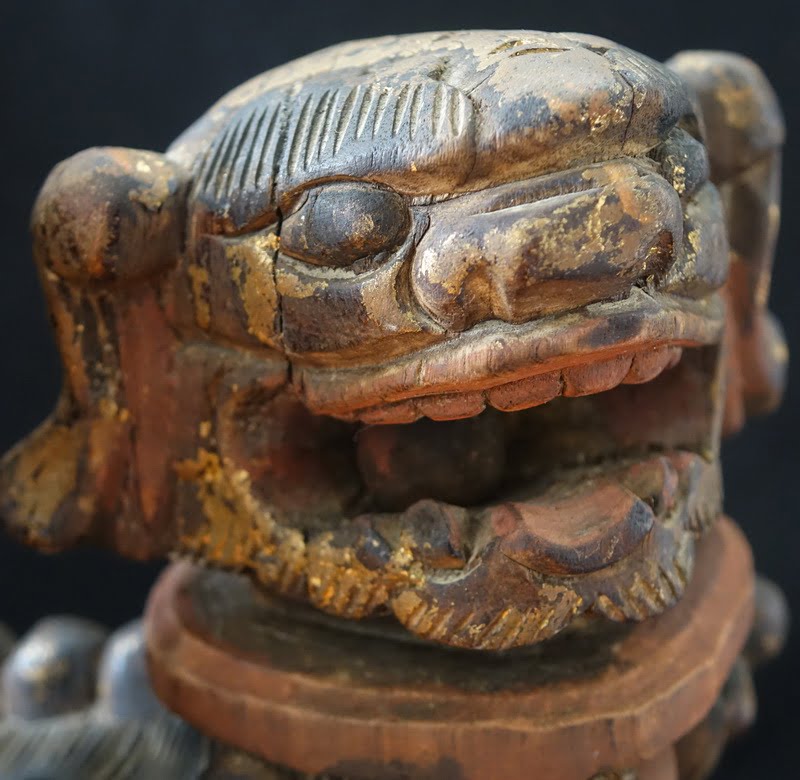 Head view Antique Chinese Camphor Wood Foo Dogs