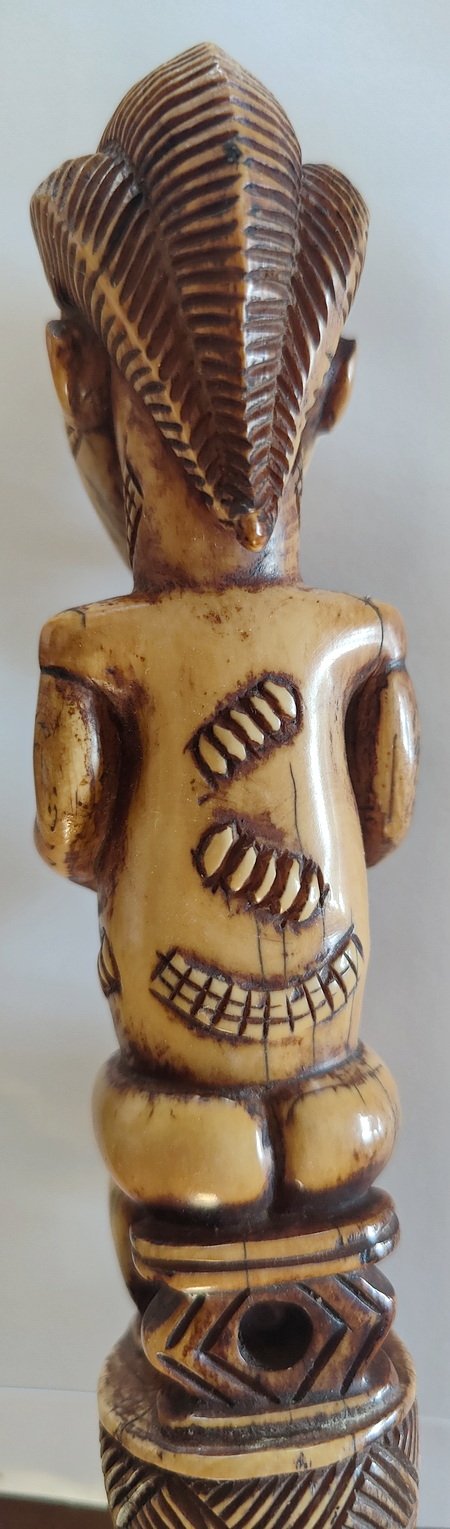 Back view Figure on top Yoruba Bone Tapper