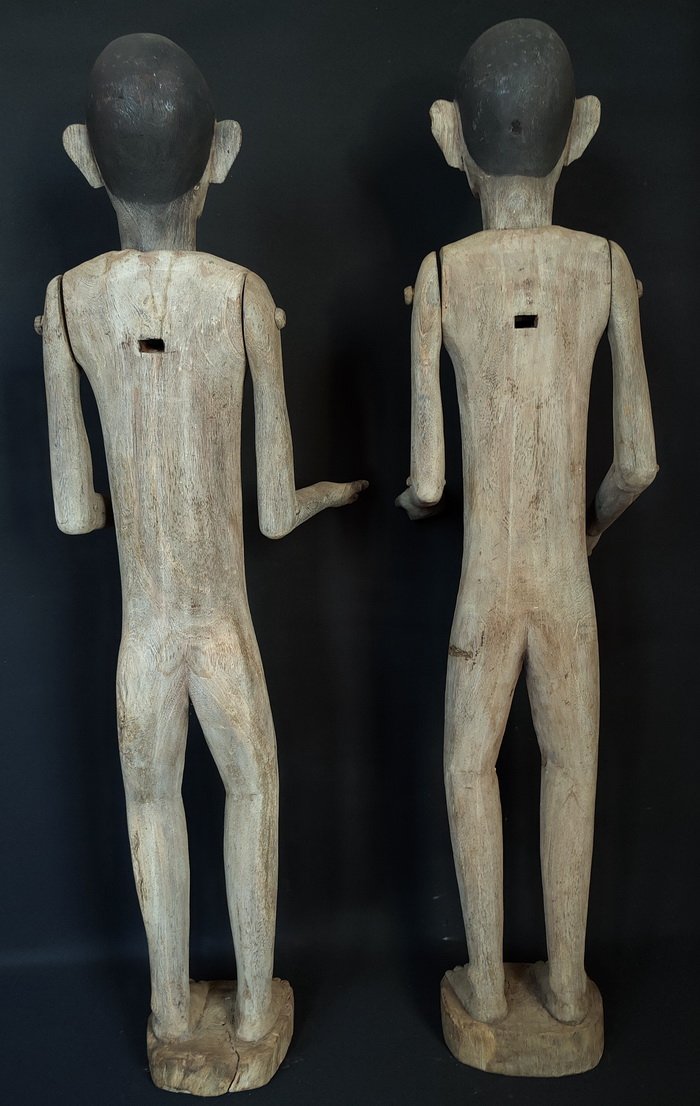 Back view Male and Female Indonesian Toraja Tau-Tau Ancestral Figures